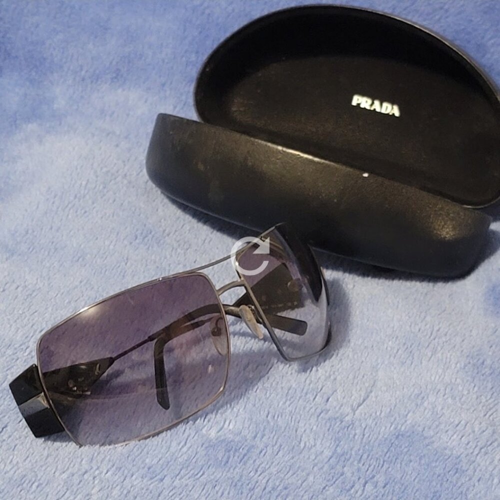 Sunglasses by Prada
